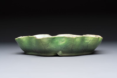 A Chinese green-enamelled lotus leaf-shaped brush washer and a Dehua blanc de Chine Milefo Buddha, 19th C