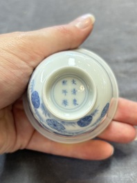 A Chinese blue and white 'mandarin duck and lotus' cup, Kangxi mark, 19th C.