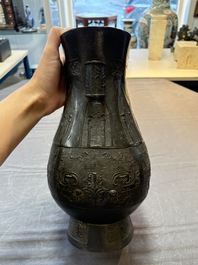 A large Chinese archaistic arrow vase with 'taotie' design, 'touhu 投壺', Yuan/Ming