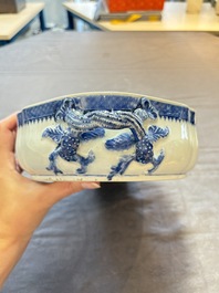 A set of two Chinese blue and white armorial dishes, a stand, and a tureen with the arms of Hughes for the English market, Qianlong, ca. 1790