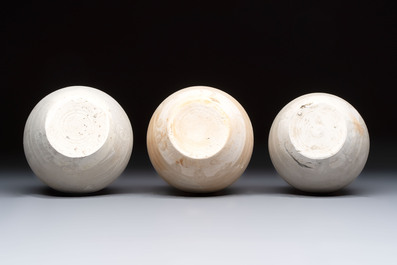 Three cream-glazed bottle vases and two jarlets from the Jepara shipwreck, Dehua or Anxi kilns, Song