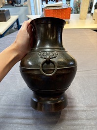 A fine Chinese archaistic bronze 'hu' vase, Song/Yuan