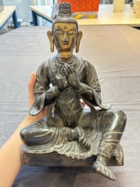 A Sino-Tibetan parcel-gilt-bronze figure of a Bodhisattva, 19/20th C.