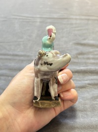 Nine Chinese blue, white, celadon-glazed and famille rose figures, 18/19th C.
