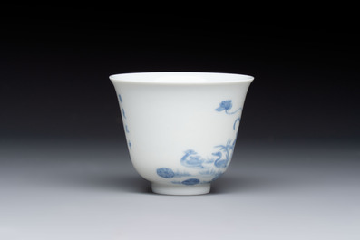 A Chinese blue and white 'mandarin duck and lotus' cup, Kangxi mark, 19th C.