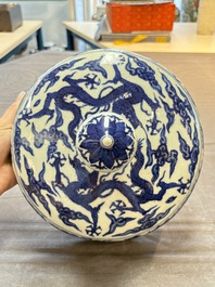 A Chinese blue and white 'dragon among clouds' cover, 20th C.