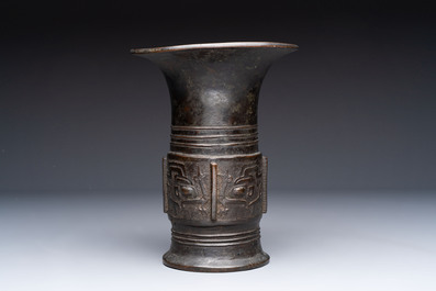 A Chinese archaistic bronze 'zun' vase, Ming