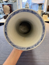 A Chinese blue and white vase with birds among flowering branches, Kangxi