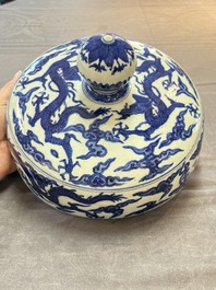 A Chinese blue and white 'dragon among clouds' cover, 20th C.