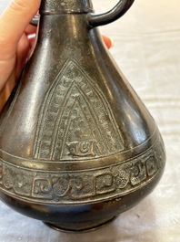 A Chinese archaistic bronze vase with dragon-form handles, Yuan/Ming