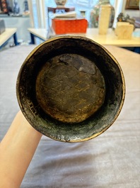 A Chinese archaistic bronze 'zun' vase, Ming