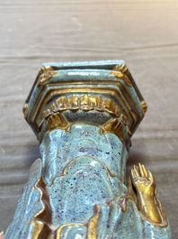 A Chinese robin's egg-glazed gilt-decorated standing Buddha, 18th C.