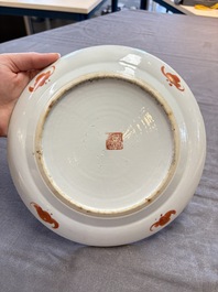 Four Chinese famille rose plates, a blue-glazed vase and a famille verte powder-blue-ground jar, Kangxi and Tongzhi marks, 19th C.