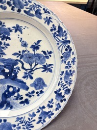 A Chinese blue and white dish with floral design, Kangxi mark and of the period