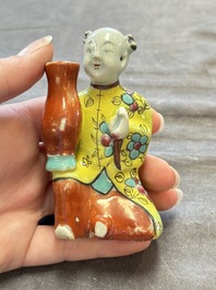 Nine Chinese blue, white, celadon-glazed and famille rose figures, 18/19th C.