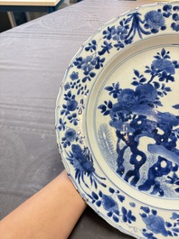 A Chinese blue and white dish with floral design, Kangxi mark and of the period