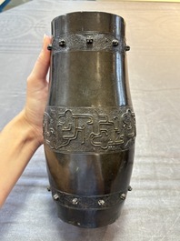 A Chinese archaistic bronze vase and a tripod censer, Yuan