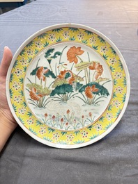 Four Chinese famille rose plates, a blue-glazed vase and a famille verte powder-blue-ground jar, Kangxi and Tongzhi marks, 19th C.