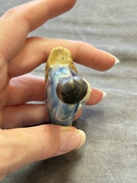 Nine Chinese blue, white, celadon-glazed and famille rose figures, 18/19th C.