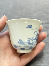 A Chinese blue and white 'mandarin duck and lotus' cup, Kangxi mark, 19th C.