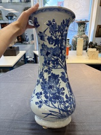 A Chinese blue and white vase with birds among flowering branches, Kangxi