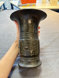 A Chinese archaistic bronze 'zun' vase, Ming