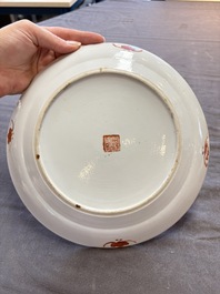 Four Chinese famille rose plates, a blue-glazed vase and a famille verte powder-blue-ground jar, Kangxi and Tongzhi marks, 19th C.
