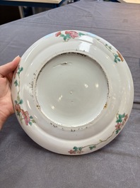 Three Chinese famille rose dishes, two plates and a saucer, various marks, 19th C.