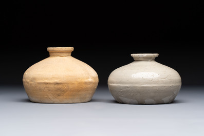 Three cream-glazed bottle vases and two jarlets from the Jepara shipwreck, Dehua or Anxi kilns, Song