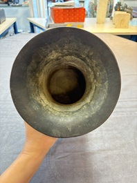 A Chinese archaistic bronze 'zun' vase, Ming