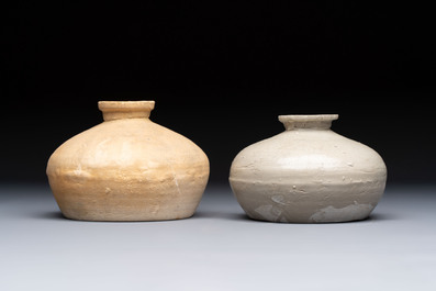 Three cream-glazed bottle vases and two jarlets from the Jepara shipwreck, Dehua or Anxi kilns, Song