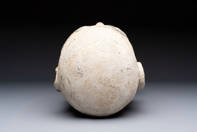 A Chinese stucco head of a Luohan, Qing