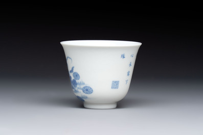 A Chinese blue and white 'mandarin duck and lotus' cup, Kangxi mark, 19th C.