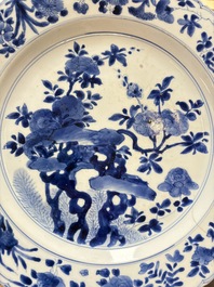 A Chinese blue and white dish with floral design, Kangxi mark and of the period