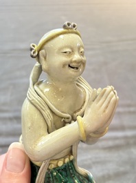 A Chinese sancai-glazed figure of Sudhana, 19th C.