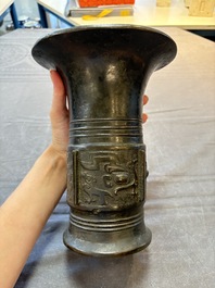 A Chinese archaistic bronze 'zun' vase, Ming