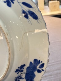 A Chinese blue and white dish with floral design, Kangxi mark and of the period
