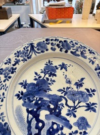 A Chinese blue and white dish with floral design, Kangxi mark and of the period