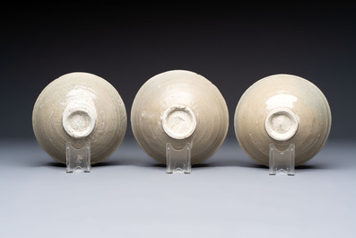 A group of 12 Chinese celadon-glazed bowls with incised floral design from the Jepara shipwreck, Fujian kilns, Song