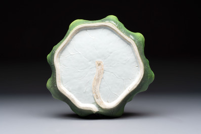 A Chinese green-enamelled lotus leaf-shaped brush washer and a Dehua blanc de Chine Milefo Buddha, 19th C