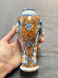 A Chinese famille rose garniture of five 'mandarin subject' vases, Qianlong