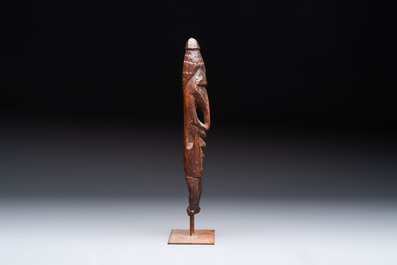 A Sepik Ramu wooden figure, Papua New Guinea