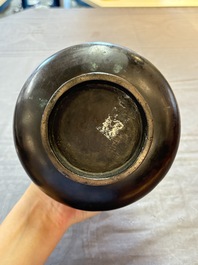 A Chinese archaistic bronze vase with dragon-form handles, Yuan/Ming