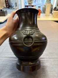 A fine Chinese archaistic bronze 'hu' vase, Song/Yuan