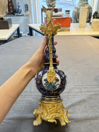 A pair of gilt-bronze-mounted Chinese famille verte powder-blue-ground double gourd vases, 19th C.