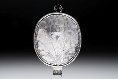 A Chinese silver-plated oval mirror, 19/20th C.