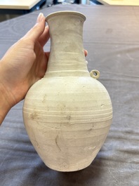 Three cream-glazed bottle vases and two jarlets from the Jepara shipwreck, Dehua or Anxi kilns, Song