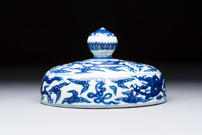 A Chinese blue and white 'dragon among clouds' cover, 20th C.