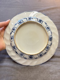 19 Chinese blue and white plates with antiquities, floral, and landscape design, Kangxi