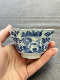 A set of 11 Chinese blue and white cups and saucers with riverscape design, Kangxi